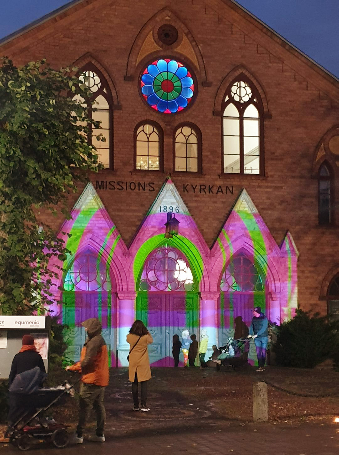 Abstract projection on church door.